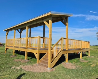 Recent deck framing project Covered deck framing completed by Ozark Mountain Dirtwork & Rentals